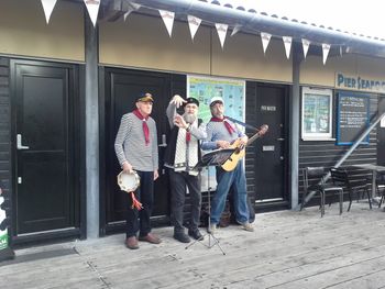 Men Overboard singing New Old Sea Songs at the famous Ha'penny Pier - the last wooden working pier in the UK.
