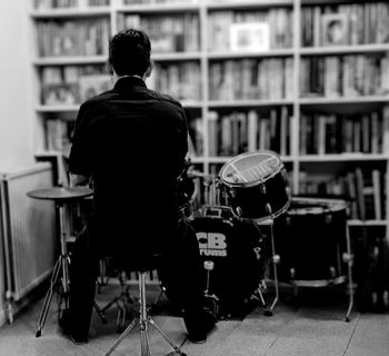 Malcolm either in the naughty corner, which presumably would have been a miscarriage of justice, or playing drums. Can't remember which. Photo by Mark Gatland
