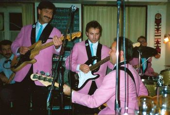 In pink Rocking and a rolling, George, Phil, Charlie and Henry
