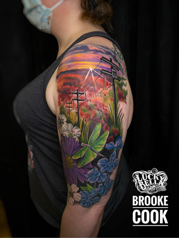 Lineman Memorial Tattoo with Floral Meadow and Insect Tattoo by Brooke Cook at Lucky Bella Tattoos in North Little Rock, Arkansas
