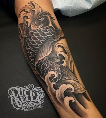 Koi tattoo by Howard Neal
