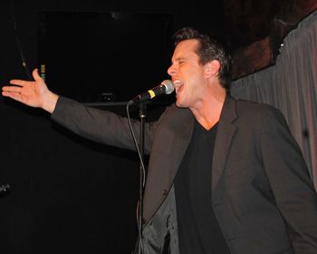 The first "Improv Karaoke Jam Night" with Chip Esten belting it out
