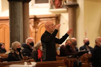 Donal McCrisken conducts during his farewell concert. Photograph - Vincent McLaughlin
