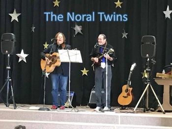 Noral_Twins_on_stage_with_logo--01-02-18
