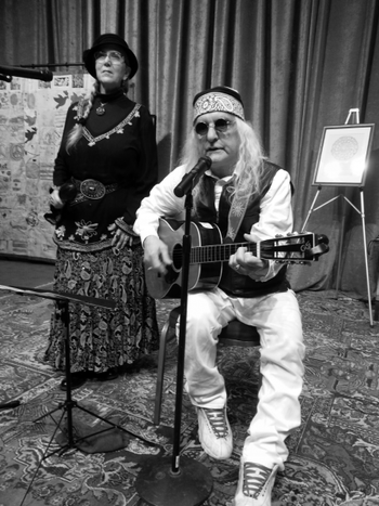 Joe Kidd & Sheila Burke on stage for Interfaith Gathering for Peace. First time ever held at Islamic
