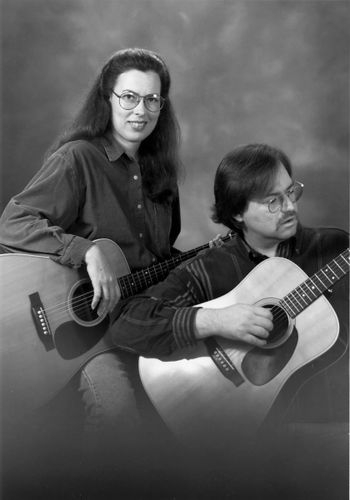 8 A Joe and Janet promo shot from the mid-90's with our duelling D-28's.
