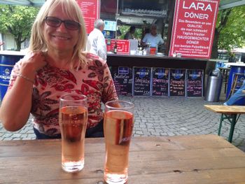 New friend Gaby demonstrates a 'small glass' of wine spritzer in Bavaria!
