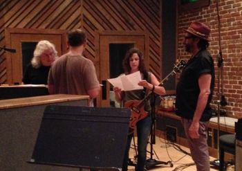 Going over charts with engineer Kevin Houston, bassist Amy LaVere, and guitar player Will Sexton during the making of The Official Record.
