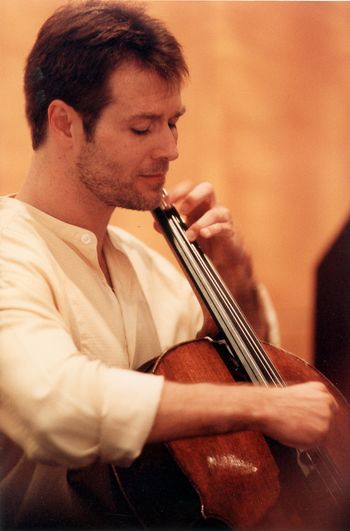 Cellist, Daniel Gaisford performing at Charles Hamlen's surprise birthday party
