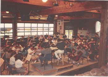 Cellist, Daniel Gaisford and conductor, Leslie Dunner rehearsing Dvorak's cello concerto
