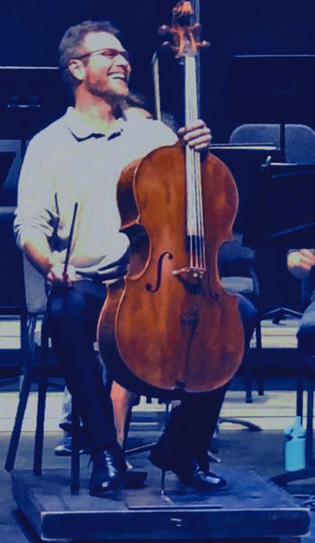 Cellist, Daniel Gaisford in rehearsal

