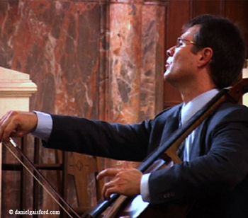 Cellist, Daniel Gaisford performing

