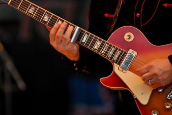 Slide Guitar A Les Paul and a metal slide
