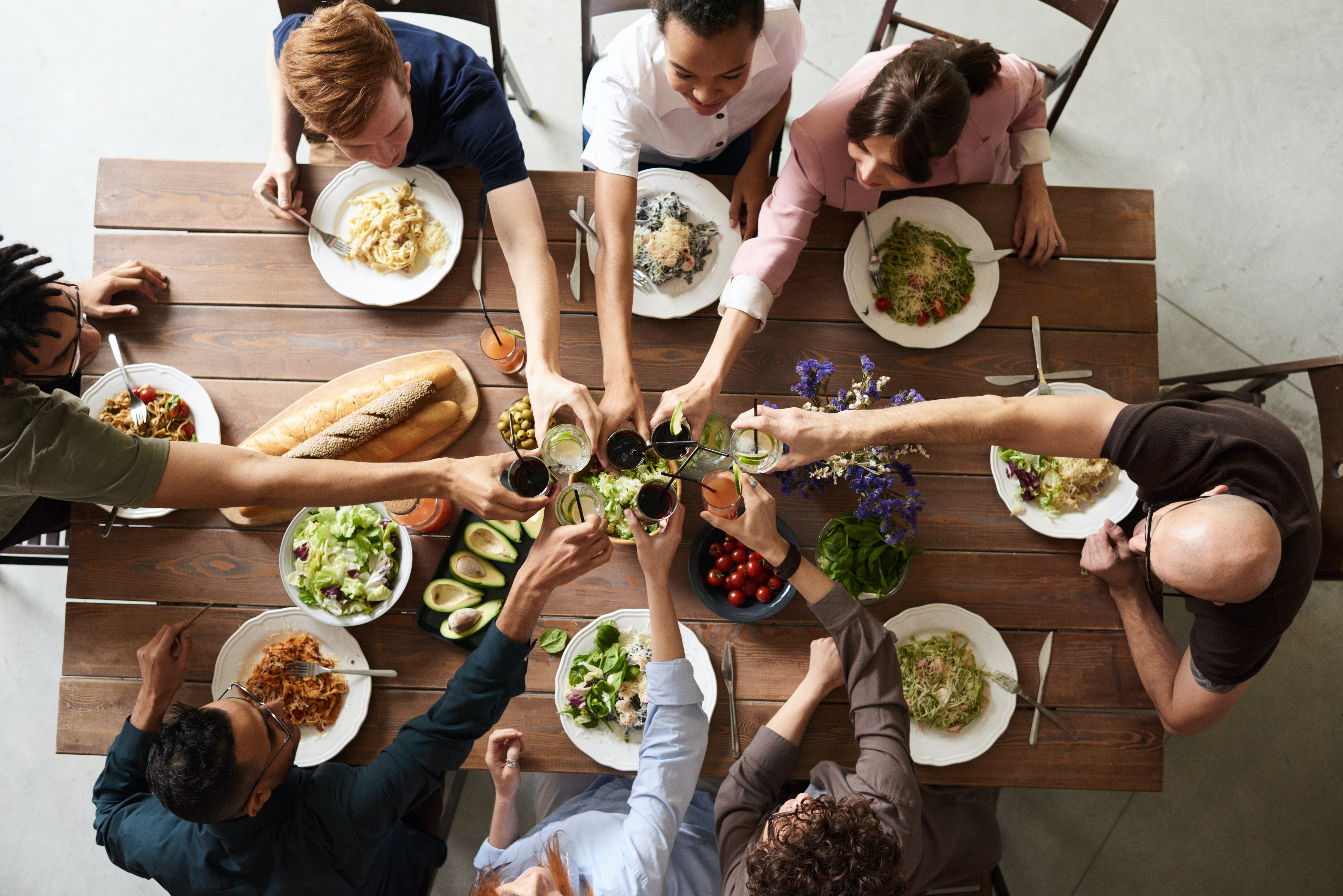 Photo by fauxels: https://www.pexels.com/photo/group-of-people-making-toast-3184183/