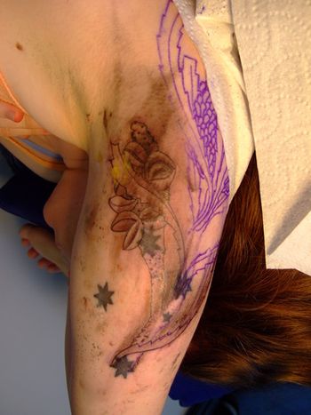 Covering old Southern Cross tattoo with an Australian Banksia
