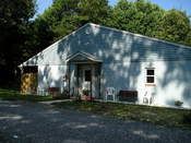 The front of the kennel after renovations and before the paved driveway.
