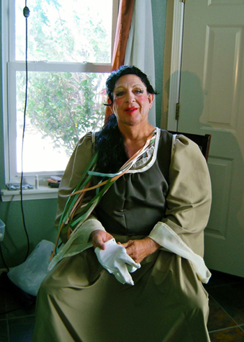 Lady Angela, readying to shoot – in a living room! – August 2009
