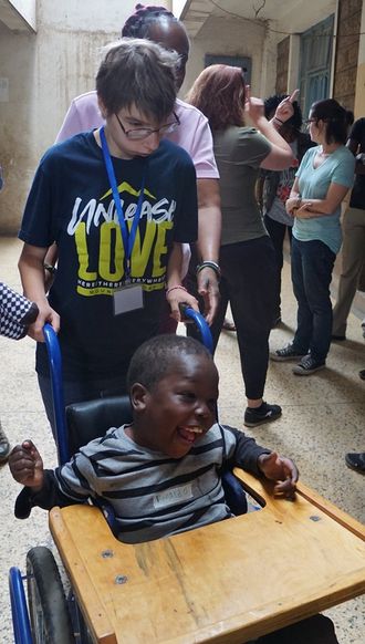 Emely on a missions trip in Africa to minister to people with disabilities.