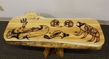 Title:"On The Trapline" Painted on a cedar table with cedar stump. Table has been covered with a special lacquer 55-1...a highly durable finish.
More photos available.
Laford paints the story of a trapper returning from a winter on the trapline.
