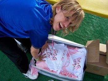 Kathleen wranglin' up the t-shirts.
