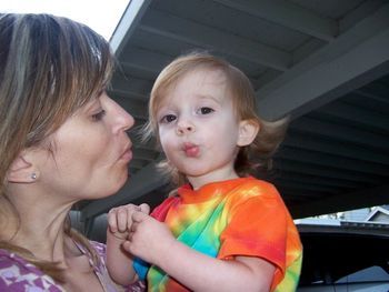 Mommy and Nat pucker up, 2006.
