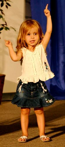 Natalie as a two-year-old, onstage in CA.
