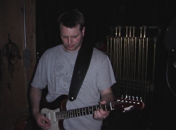 Kaika with his favorite Melancon guitar.
