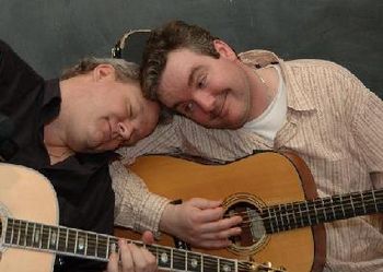 Gary Young and Morgan Keating, guitarists co-joined at the head. Photo stolen from their web-site at www.russell-hill.com.
