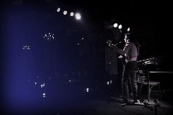 girl and guitar shake off 27 inches of snow to play The Cutting Room...photo by Dan Fine
