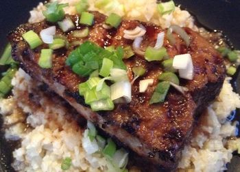 Tuna Steaks with Garlic and Ginger Sauce on Sesame Cauliflower with Scallions
