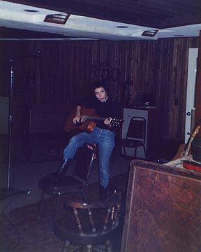 Carolyne at work on a song in the studio.
