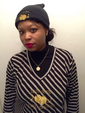 2015 LADY SOUL CEO MS. CRYSTAL aka BONITA SENORITA wearing grey & black striped LADY SOUL shirt with gold metallic logo & words!!!!
