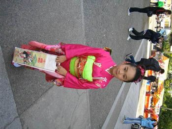 Girl at a Tokyo temple dressed up for a special ceremony
