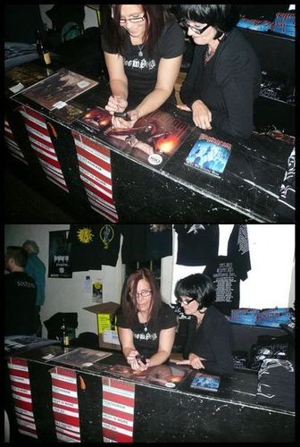 Caroline De Haas Bjørneboe and Kim Stinnett Tomaselli selling Doomdogs and Pentagram merch
