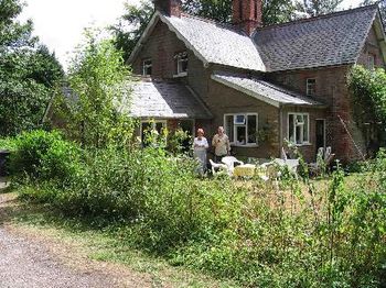 No, Andy wasn't there when we got there.  This picture was taken later by Tom coming back from a run, but it also shows the house and Ian's Mum to whom we also owe our thanks!
