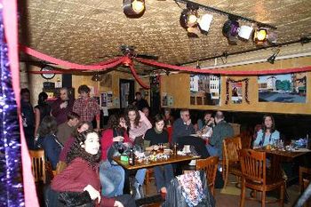 We decorated Freddy's Backroom and then the crowd started to gather.  Each table was strewn with dollar store treasures including minature plastic animals.
