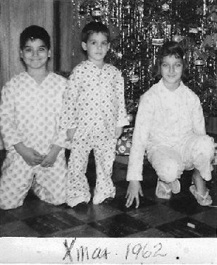Children of the damned...cool jammies, and hands on balls again.  Jeez.  Michael was a shrimp, in retrospect.  Check out his jammie bottoms.
