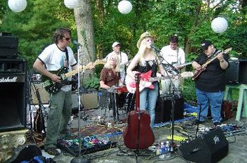 Jennifer and the band jamming with the greatest guitar player alive, Johnny Hiland (far right) @ a party in Nashville.
