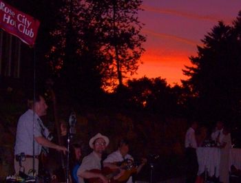 A dramatic sunset provides an elegant backdrop for swingin' music at the gala opening of the Street of Dreams showcase of fabulous custom homes.  The Rose City Hot Club, featuring Bob, Ben, John and D
