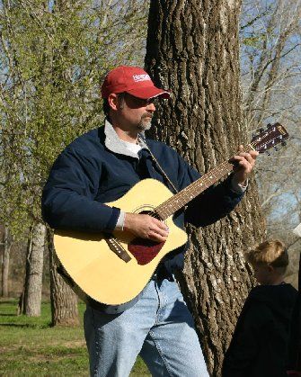 Ray Miller, Leading Worship at a Boy Scout campout
