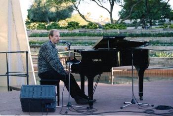 Alex at outdoor concert in Scottsdale, AZ. Photo by Rod Nelson, used by kind permission.
