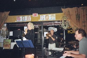 Kathryn with The Expandable Jazz Band; Bob Zottola, trumpet; Stu Shelton, keyboard; John Lamb hiding with drums at Bayshore Coffee Company, Naples Florida,  Sept 07
