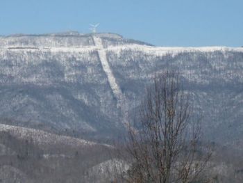 Wind Rock Mountain, Winter. Winter 2011 was snowy here.  I took this photo of Wind Rock Mountain from the top of West Outer Drive, close to where I live.  You can faintly see the windmills atop the mo
