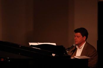 Holy Trinity parishioner and music leader Fred Bueche adds some very nice touches with the piano and his vocals.
