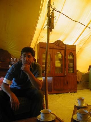 Nadeem in tent village
