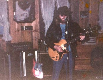 Spoons playing my Gibson L6 at the Little Jap Tea House in Bryant Pond circa 1982.
