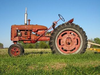My little red tractor, Putt Putt Putting along.
