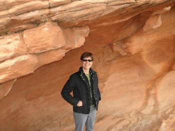 Beth standing in a cave at Valley of Fire State park
