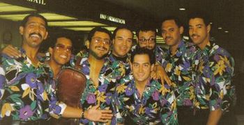 Members of Johnny Pacheco's Tumbao in Japanese Tour 1991. L-R Luis Rodriguez, Luis Tirano Rodriguez, RV, Chino Nuñez, Marcos Quintanilla, Hector Colon, Carlos Jimenez, Willie Romero.
