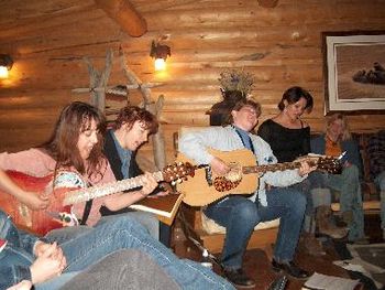 Loretta McNair, Hilde Sevens, Amy Jo Ellis, Angela McArthur and Jan Eller performing the song they wrote earlier in the day
